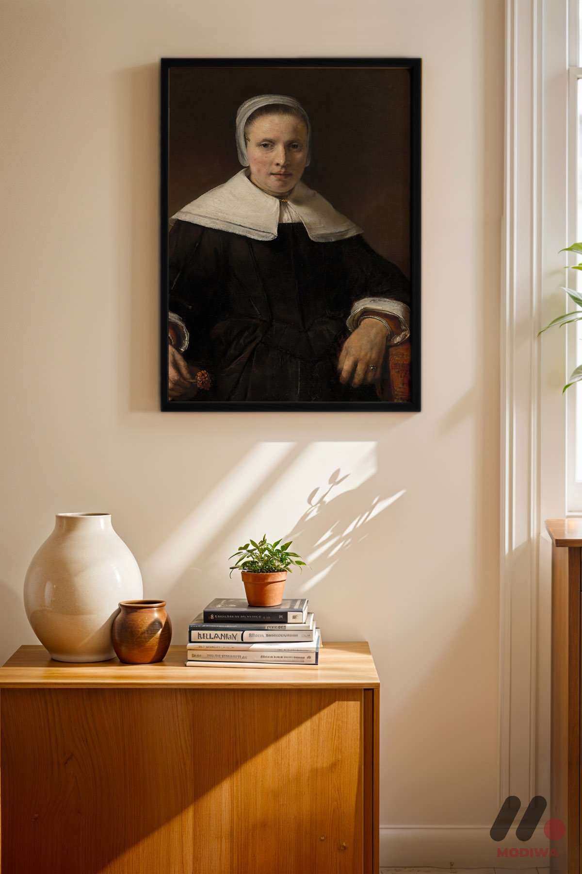 Rembrandt Beyaz Yakalı Kadın siyah çerçeveli duvar tablosu, konsol üstündeki duvarda