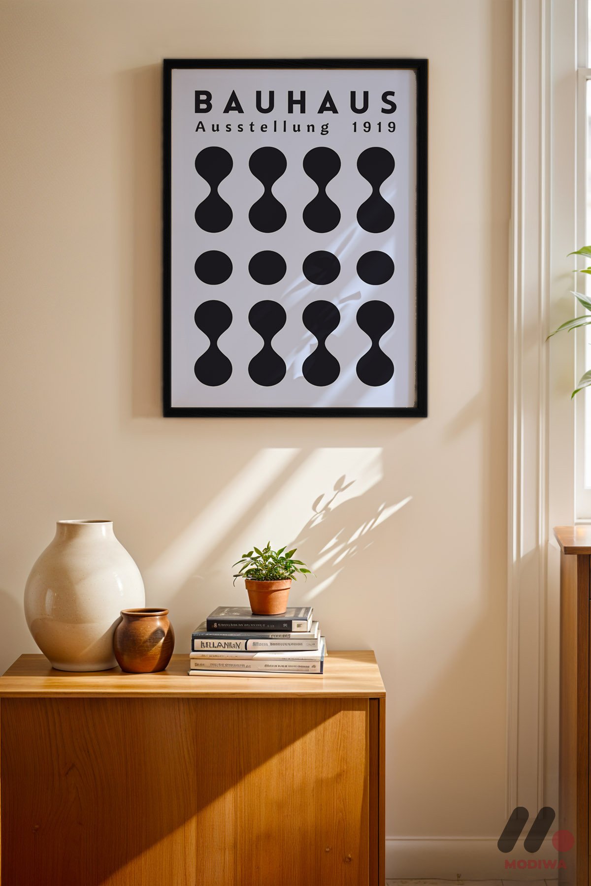 Bauhaus 1919 Nokta Deseni siyah çerçeveli duvar tablosu, konsol üstündeki duvarda