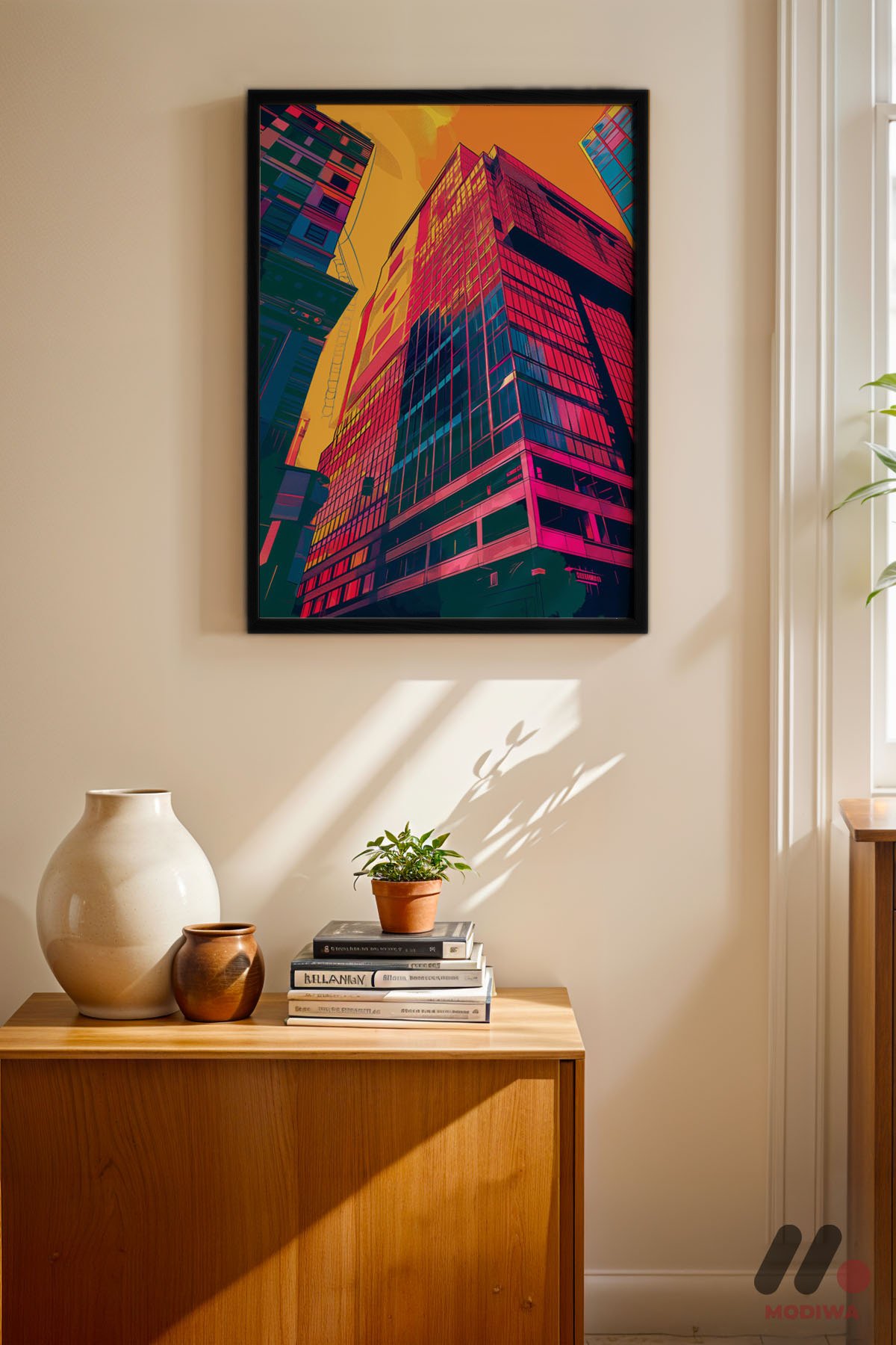 Renkli Bina Pop Art siyah çerçeveli duvar tablosu, konsol üstündeki duvarda